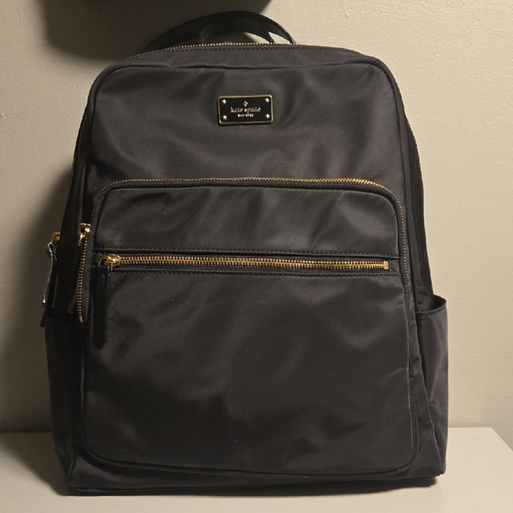 kate spade Handbags - Kate Spade Black Backpack with Gold Accents